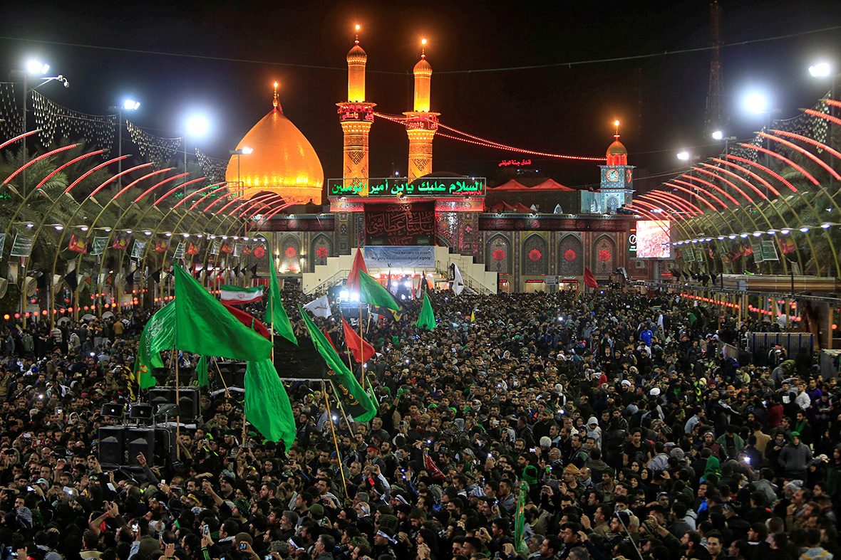 مواجهة بكربلاء.. كيف ردَّ العراقيون على صورة الحسين التي علَّقها الإيرانيون في مسيرة الأربعين