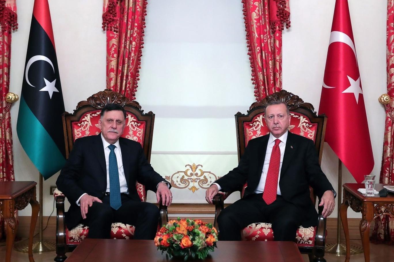 أردوغان والسراج/ رويترز