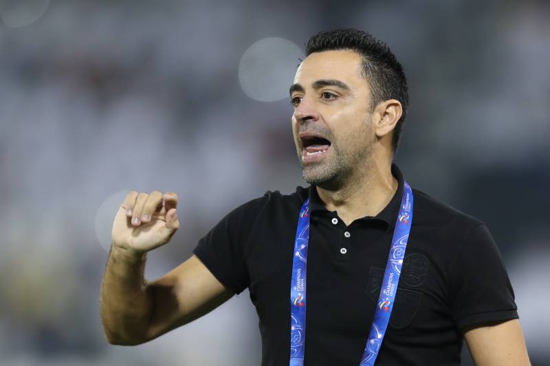 تشافي رحل عن السد لقيادة برشلونة (رويترز)