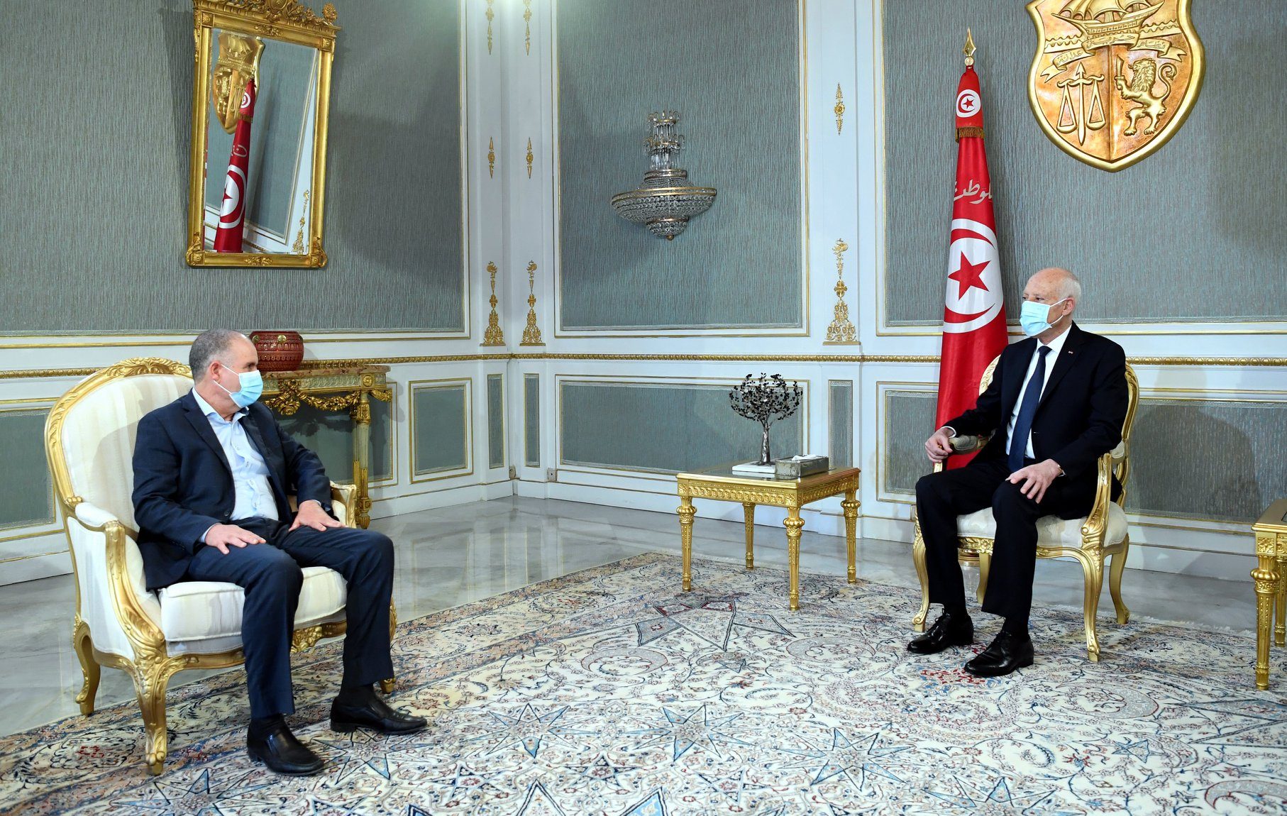الرئيس التونسي قيس سعيد ونور الدين الطبوبي الأمين العام لاتحاد العام التونسي / مواقع التواصل الاجتماعي